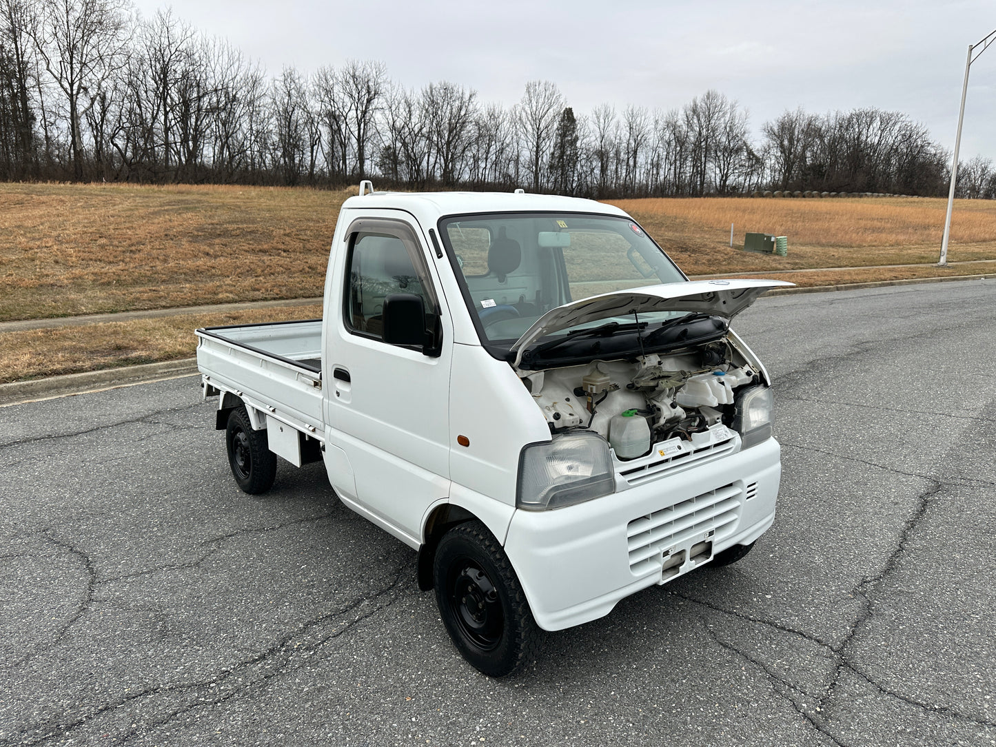 1999 SUZUKI CARRY -4WD -FUEL INJECTED -2 SPEED TRANSFER-CASE -A/C — LOT#754