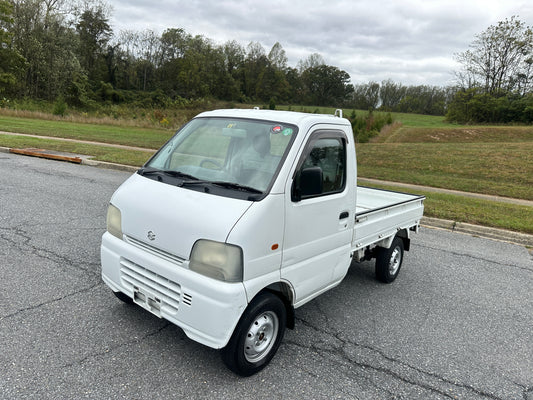 1999 SUZUKI CARRY -4WD -FUEL INJECTED -2 SPEED TRANSFER-CASE — LOT#671