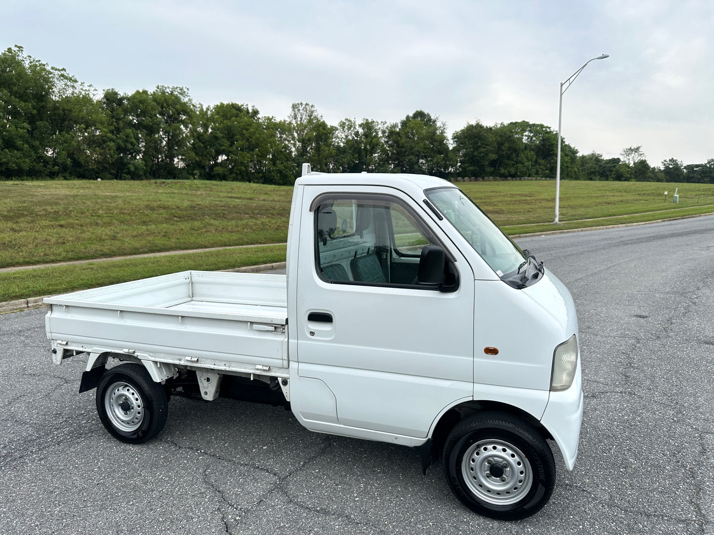 1999 SUZUKI CARRY -4WD -FUEL INJECTED -2 SPEED TRANSFER-CASE -AIR CONDITIONING — LOT#651