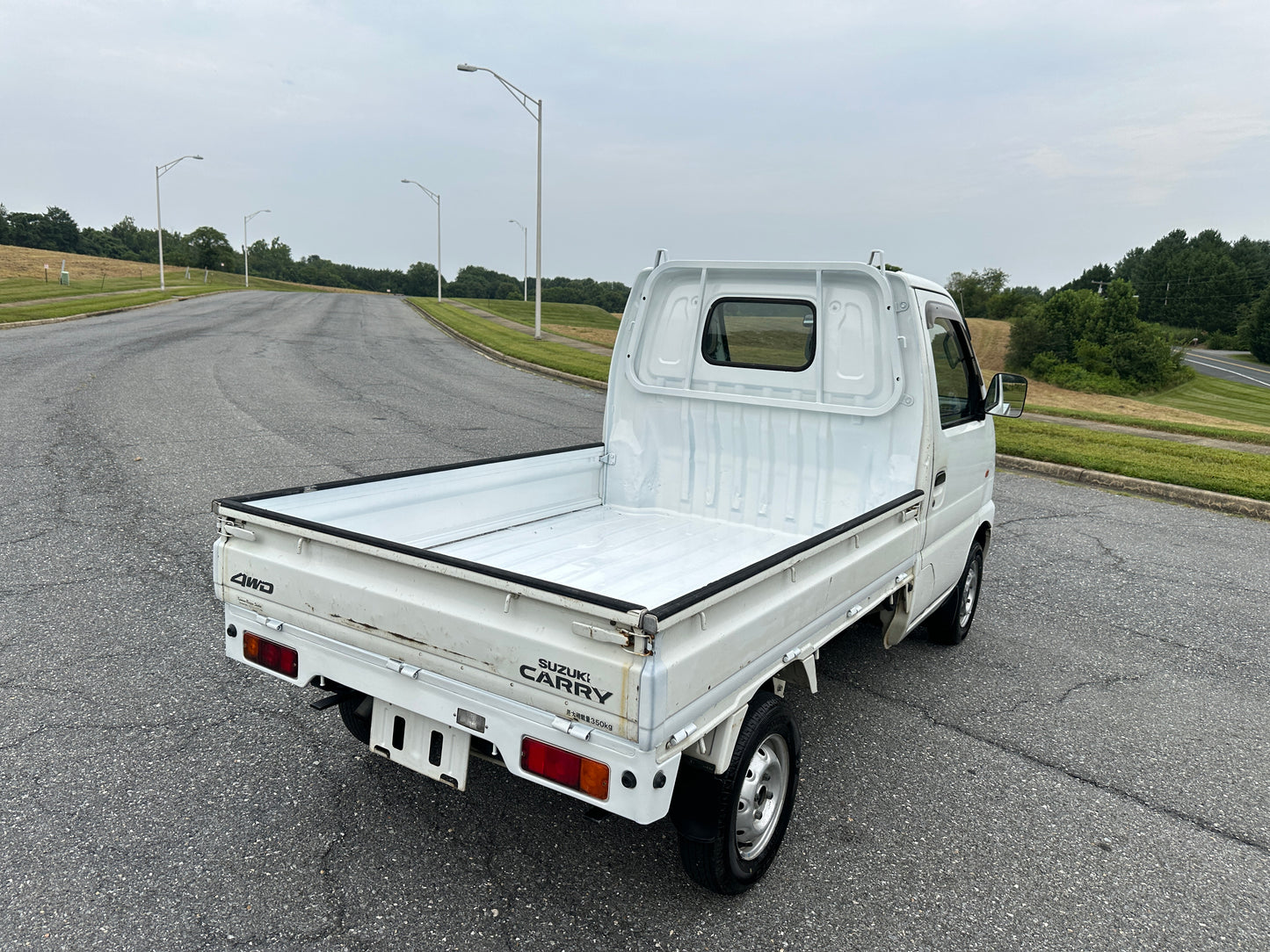 1999 SUZUKI CARRY -4WD -FUEL INJECTED -2 SPEED TRANSFER-CASE  -AIR CONDITIONING — LOT#598