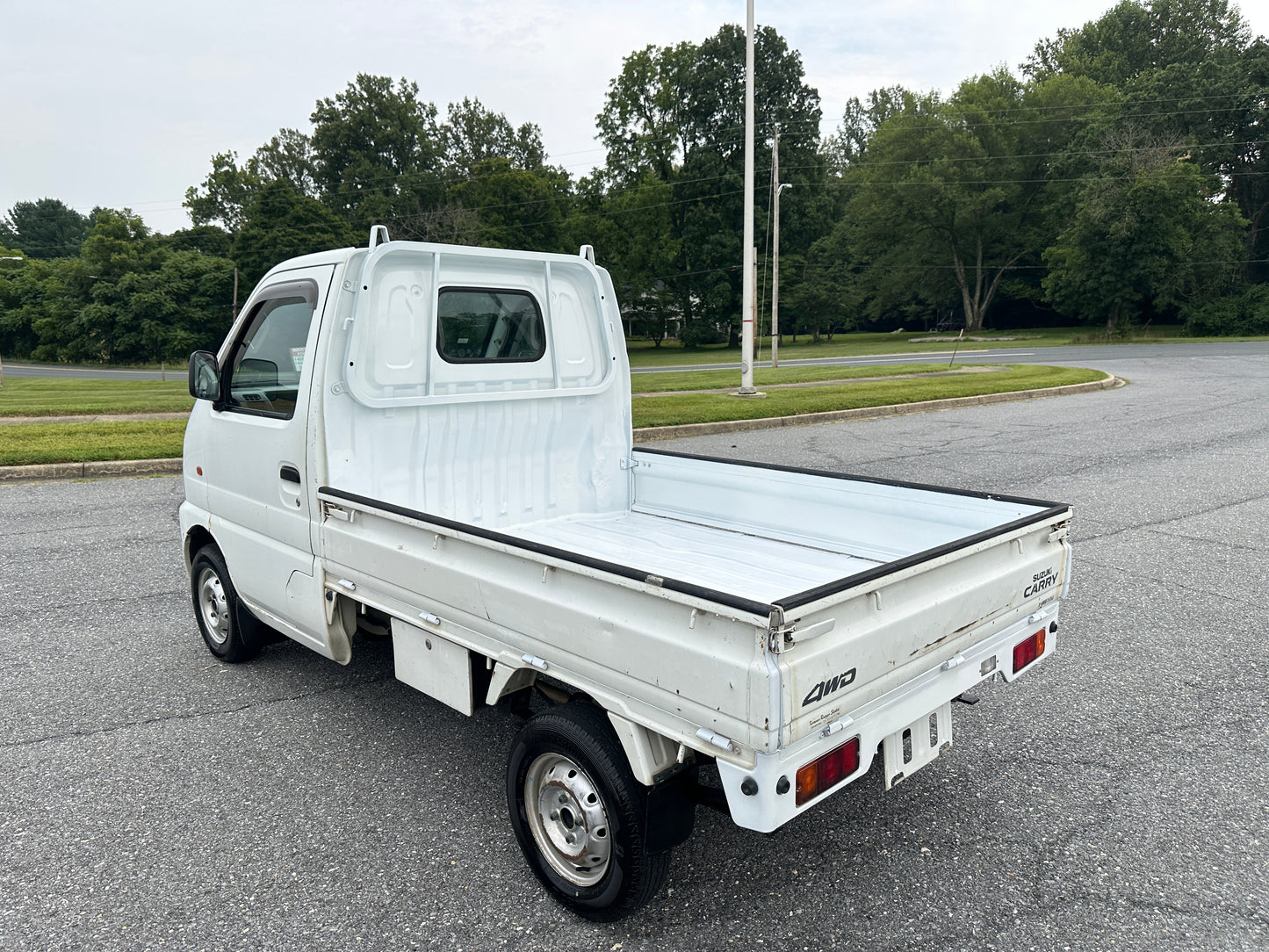 1999 SUZUKI CARRY -4WD -FUEL INJECTED -2 SPEED TRANSFER-CASE  -AIR CONDITIONING — LOT#598