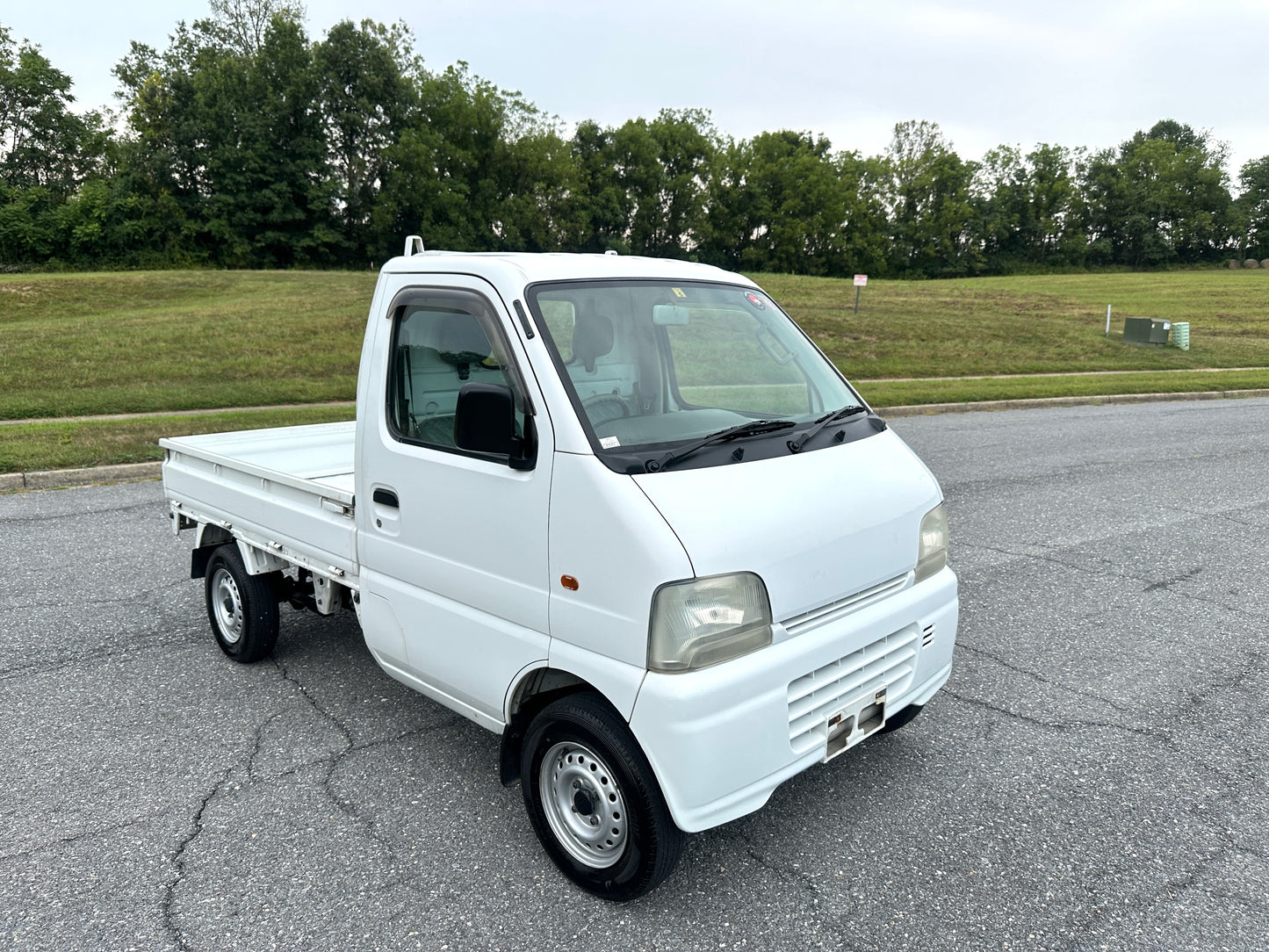 1999 SUZUKI CARRY -4WD -FUEL INJECTED -2 SPEED TRANSFER-CASE -AIR CONDITIONING — LOT#651